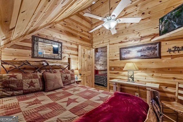 bedroom with wooden walls