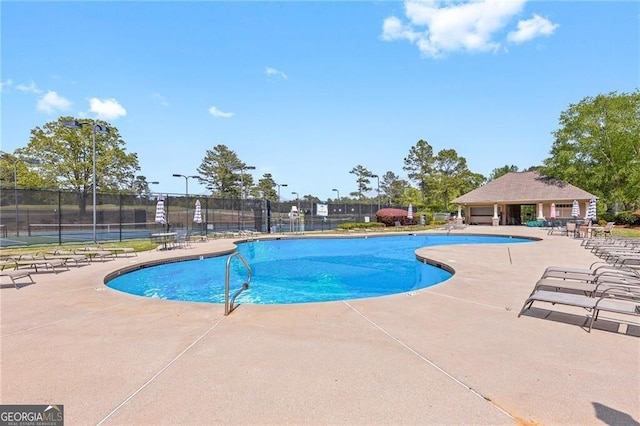 9620 Coastal Pointe Dr, Villa Rica, GA 30180 - pool with a patio area and fence
