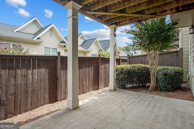 view of patio / terrace with fence