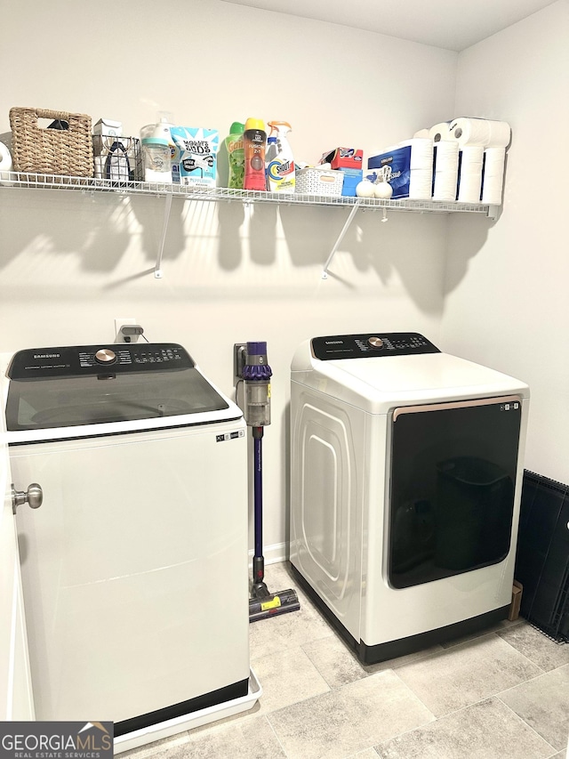 laundry room with laundry area and separate washer and dryer