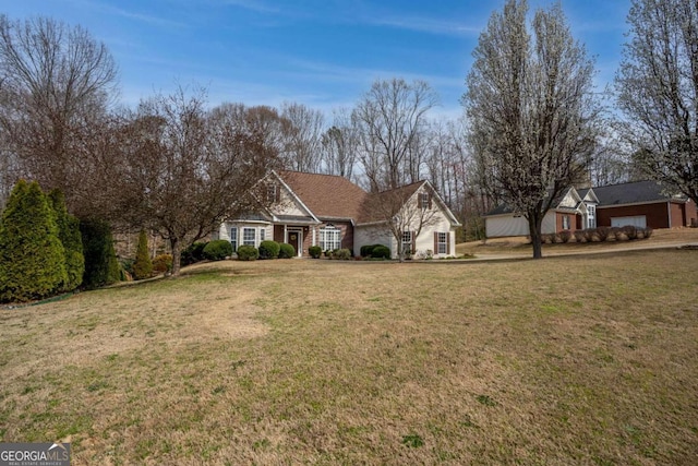 4838 Netherlands Pl, Flowery Branch, GA 30542 - view of front of house with a front yard