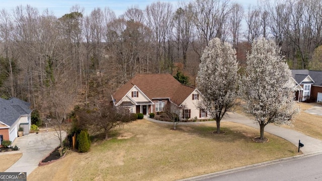 4838 Netherlands Pl, Flowery Branch, GA 30542 - view of front of house featuring concrete driveway and a front lawn