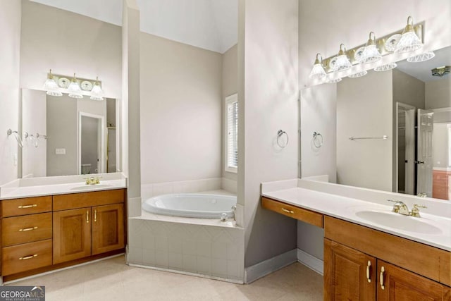 4838 Netherlands Pl, Flowery Branch, GA 30542 - full bath featuring a bath, two vanities, and tile patterned floors