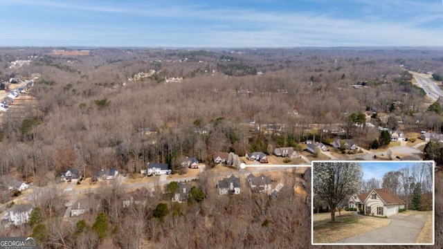4838 Netherlands Pl, Flowery Branch, GA 30542 - aerial overview of property's location with a heavily wooded area