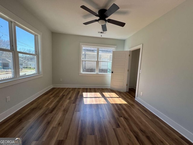 1510 Olympian Way SW, Atlanta, GA 30310 - unfurnished room with plenty of natural light, dark wood finished floors, and a ceiling fan