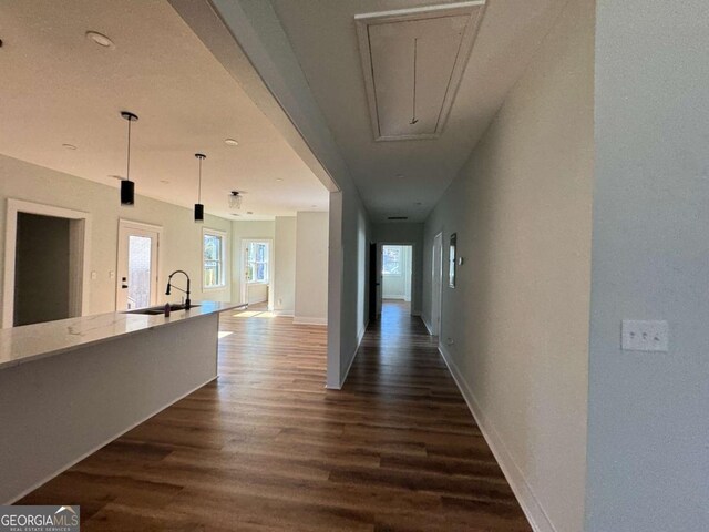 1510 Olympian Way SW, Atlanta, GA 30310 - hallway featuring dark wood-style flooring, attic access, and plenty of natural light