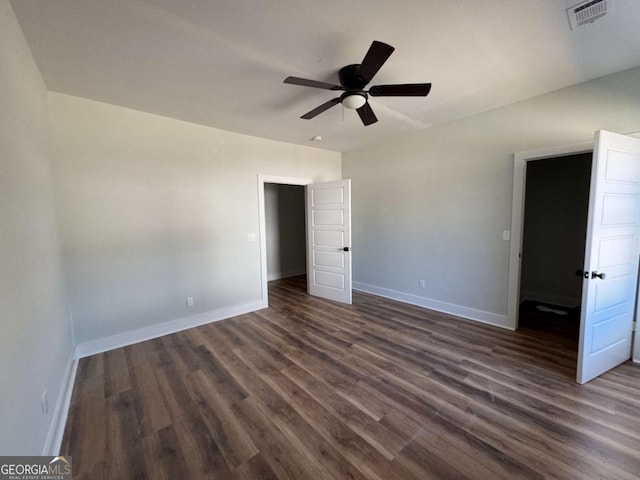 1510 Olympian Way SW, Atlanta, GA 30310 - unfurnished bedroom with dark wood-type flooring and a ceiling fan