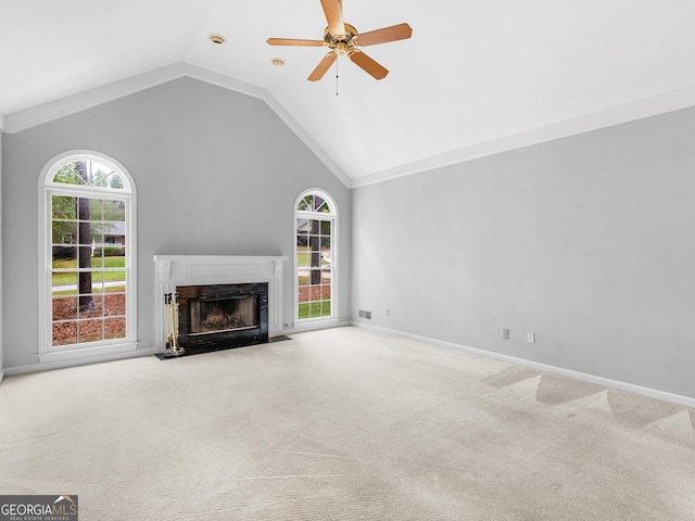 1300 Lakehaven Pkwy, Mcdonough, GA 30253 - unfurnished living room featuring lofted ceiling, carpet floors, a premium fireplace, and ceiling fan