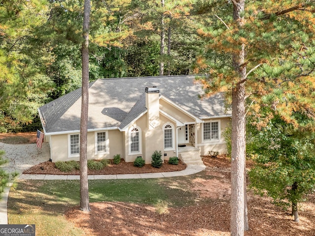 1300 Lakehaven Pkwy, Mcdonough, GA 30253 - single story home with a chimney, stucco siding, and a shingled roof