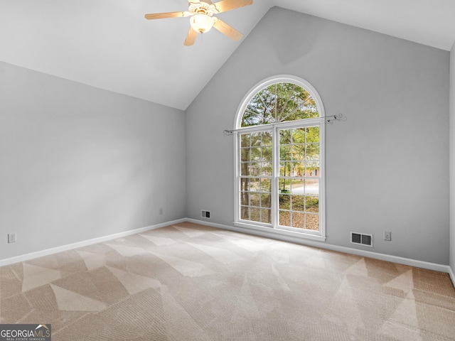 1300 Lakehaven Pkwy, Mcdonough, GA 30253 - empty room with vaulted ceiling, ceiling fan, and carpet floors