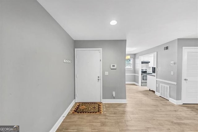 117 Lablanc Way NW, Atlanta, GA 30327 - foyer featuring visible vents, light wood-type flooring, and baseboards