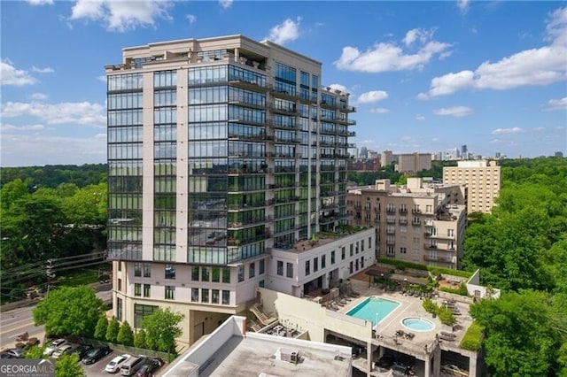 view of building exterior featuring a view of city