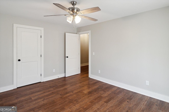 unfurnished bedroom with baseboards, a ceiling fan, and wood finished floors