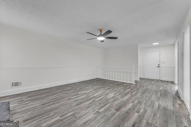 4304 Ruth Ln, Powder Springs, GA 30127 - empty room featuring baseboards, visible vents, a ceiling fan, and wood finished floors