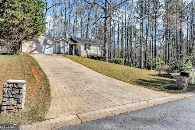 4304 Ruth Ln, Powder Springs, GA 30127 - ranch-style home featuring driveway, an attached garage, and a front yard