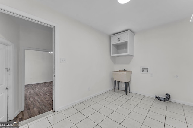 4304 Ruth Ln, Powder Springs, GA 30127 - washroom featuring baseboards, washer hookup, laundry area, and light tile patterned floors