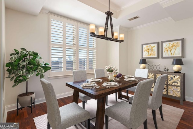 dining area featuring visible vents, baseboards, dark wood-style floors, and a chandelier