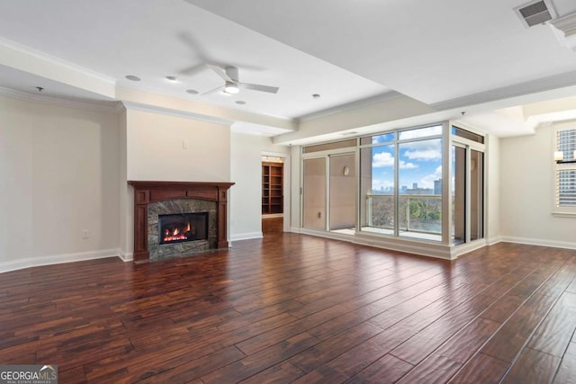 unfurnished living room with wood finished floors, a ceiling fan, and crown molding