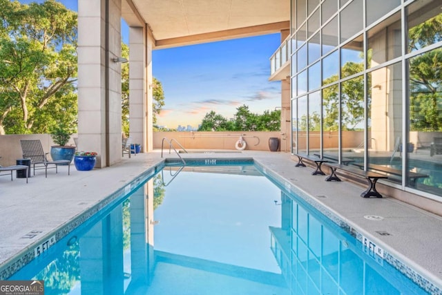 pool with a patio