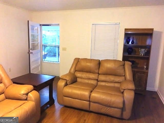 living area with wood finished floors