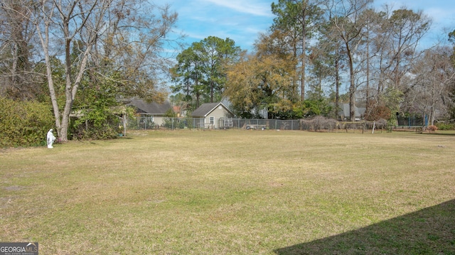 view of yard featuring fence