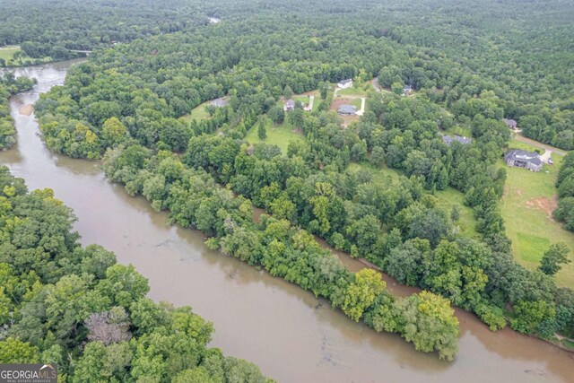 303 Tumbling Shoals Ct, Gray, GA 31032 - aerial view featuring a wooded view and a water view