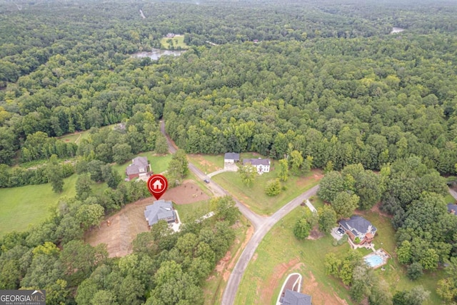 303 Tumbling Shoals Ct, Gray, GA 31032 - drone / aerial view with a forest view