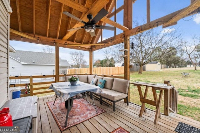 22 Valley Creek Dr SW, Cartersville, GA 30120 - wooden deck featuring a shed, a yard, a ceiling fan, fence, and an outbuilding