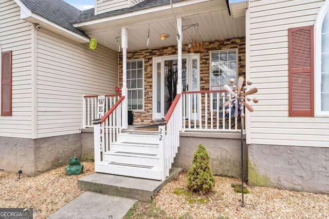 22 Valley Creek Dr SW, Cartersville, GA 30120 - doorway to property featuring a porch and roof with shingles