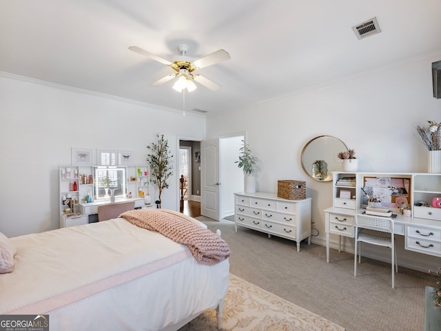 bedroom featuring visible vents, ceiling fan, ornamental molding, and carpet flooring