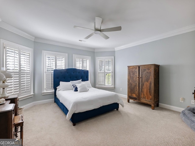 bedroom with baseboards, ornamental molding, and light carpet