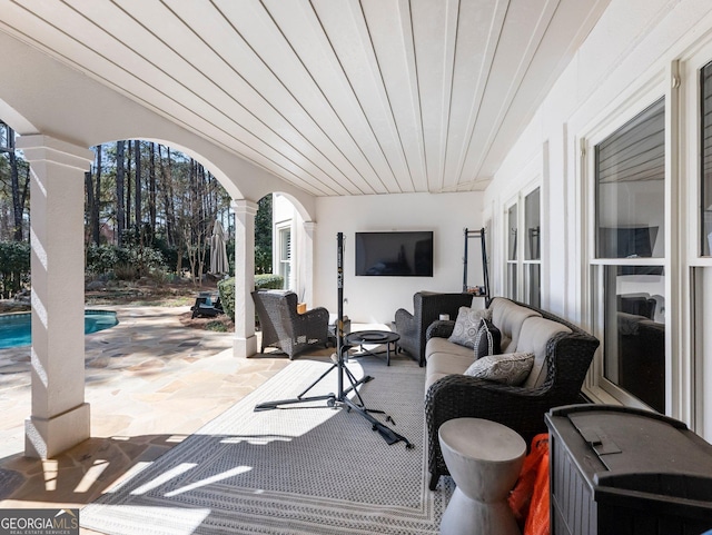 view of patio with an outdoor hangout area and an outdoor pool