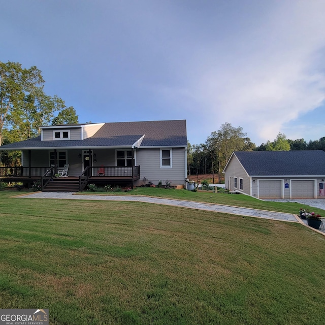 107 Oak Way Dr, Eastanollee, GA 30538 - view of front of home featuring a front lawn, a porch, roof with shingles, a garage, and driveway