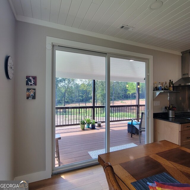 107 Oak Way Dr, Eastanollee, GA 30538 - doorway to outside featuring visible vents, wood ceiling, light wood-style flooring, and crown molding