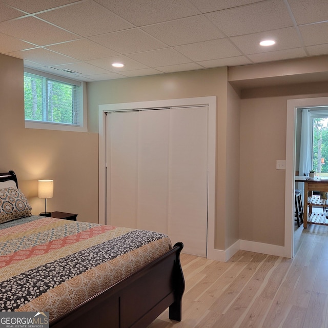 107 Oak Way Dr, Eastanollee, GA 30538 - bedroom with baseboards, a drop ceiling, light wood-type flooring, recessed lighting, and a closet