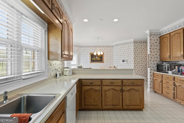 kitchen with brown cabinets, wallpapered walls, crown molding, light countertops, and white dishwasher