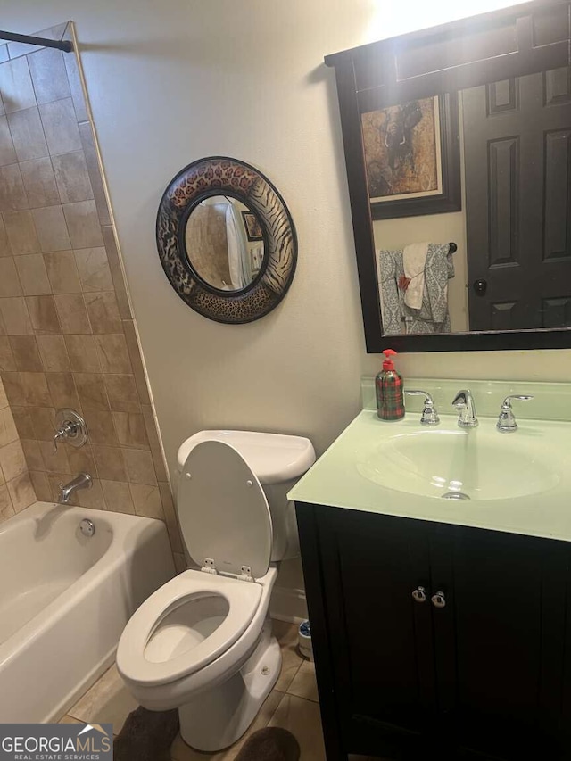 10390 Rivertown Rd, Fairburn, GA 30213 - full bathroom featuring toilet, tile patterned floors, shower / bath combination, and vanity