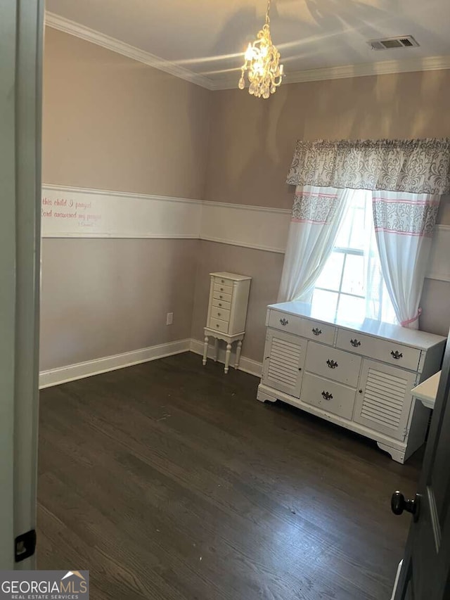 10390 Rivertown Rd, Fairburn, GA 30213 - bedroom with ornamental molding, dark wood-style floors, a chandelier, and baseboards
