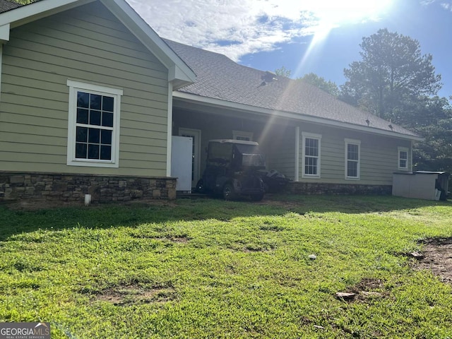 10390 Rivertown Rd, Fairburn, GA 30213 - back of house with a yard and stone siding