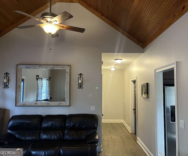 10390 Rivertown Rd, Fairburn, GA 30213 - living room with lofted ceiling, wooden ceiling, wood finished floors, ceiling fan, and baseboards