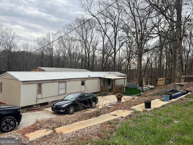 exterior space featuring metal roof