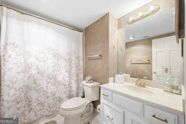 3530 Piedmont Rd NE Unit 3I, Atlanta, GA 30305 - bathroom with vanity, a textured ceiling, and tile patterned flooring