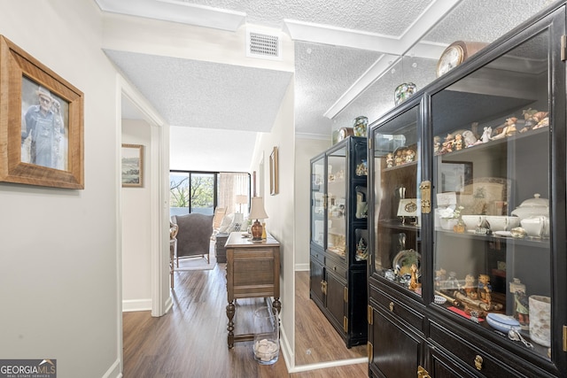 3530 Piedmont Rd NE Unit 3I, Atlanta, GA 30305 - corridor with a textured ceiling and wood finished floors