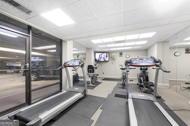 3530 Piedmont Rd NE Unit 3I, Atlanta, GA 30305 - exercise room featuring a paneled ceiling