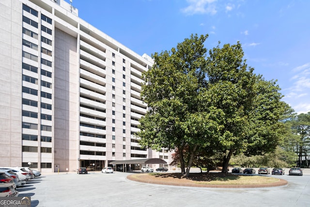 3530 Piedmont Rd NE Unit 3I, Atlanta, GA 30305 - view of building exterior with uncovered parking