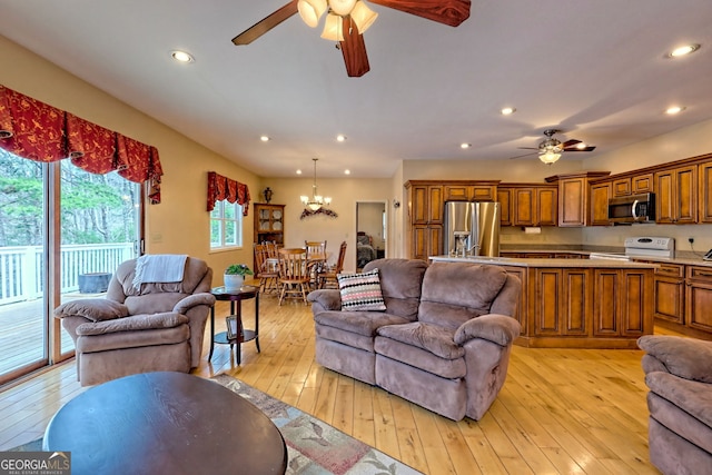 1068 Coleman River Rd, Clayton, GA 30525 - living area with ceiling fan, a chandelier, recessed lighting, and light wood finished floors