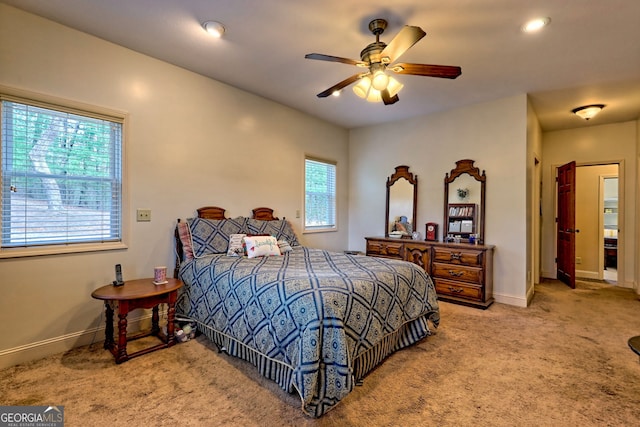 1068 Coleman River Rd, Clayton, GA 30525 - carpeted bedroom with multiple windows, baseboards, and a ceiling fan