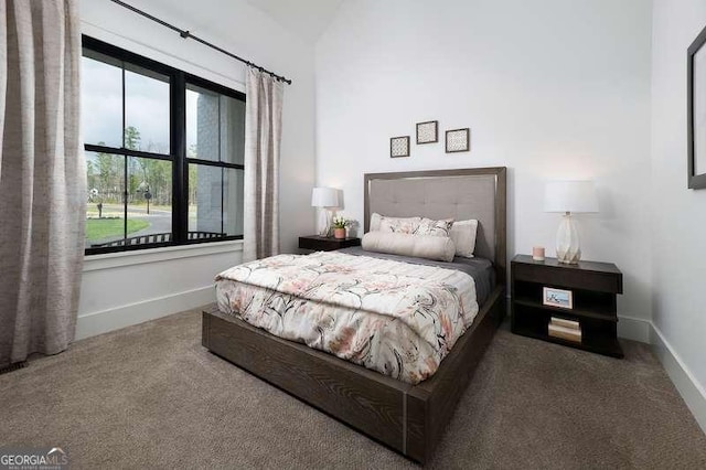 carpeted bedroom with baseboards