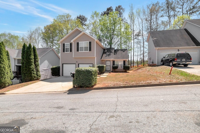 view of front of house with driveway and a garage