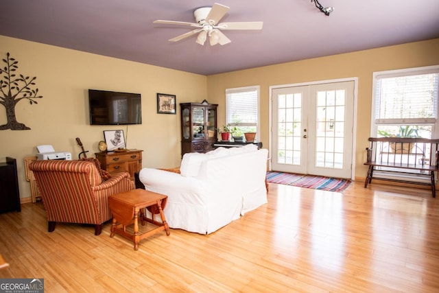 1041 Oconee Forest Ln, Watkinsville, GA 30677 - living area featuring french doors, ceiling fan, and light wood finished floors